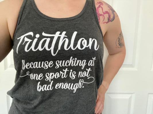 BASE Women's Tank — "Sucking At One Sport"